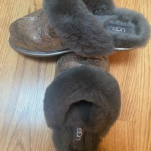 Genuine cozy UGG slippers. Color: Gunmetal Like brand new. Rarely worn.